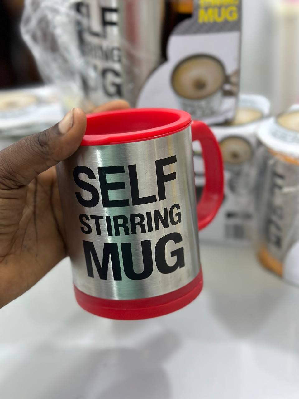 Self stirring mug